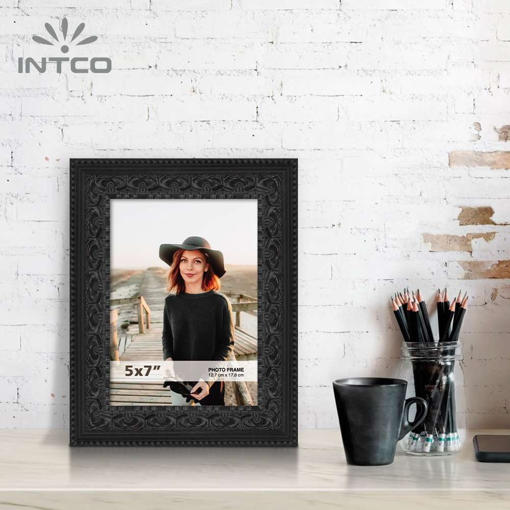 Add a bold look to your home with this antique black picture frame
